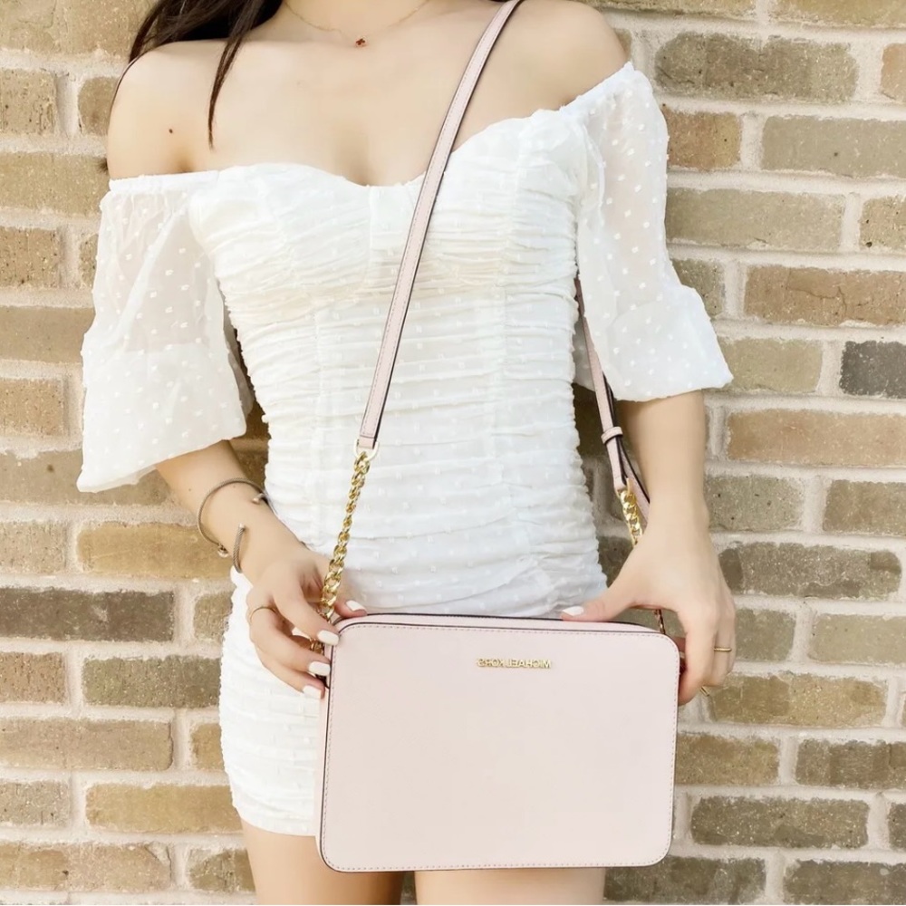 Michael Kors “Jetset Travel Large” pink crossbody